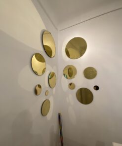 Alternative view of Kintsugi circular mirror with gold shades, full set up